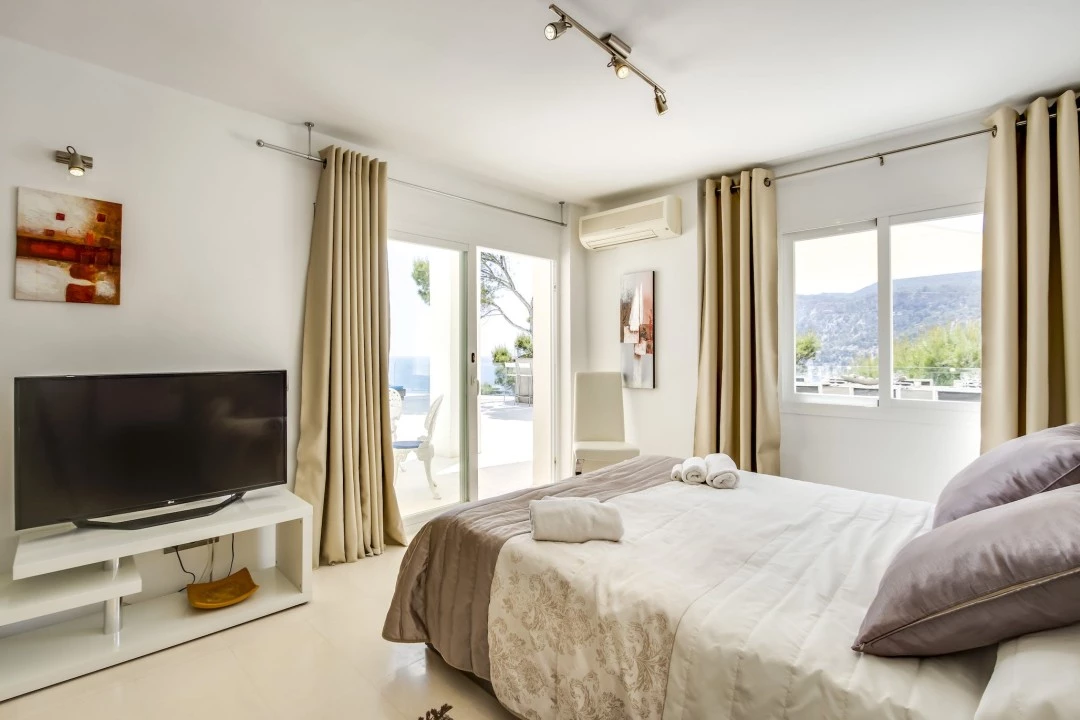 1681216711-Luxury real estates Ibiza to rent villa Raya Bedroom  4 .webp